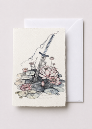 Sword of Serenity 5x7 deckled-edge greeting card showing slender sword rising from a lotus pond with a white envelope